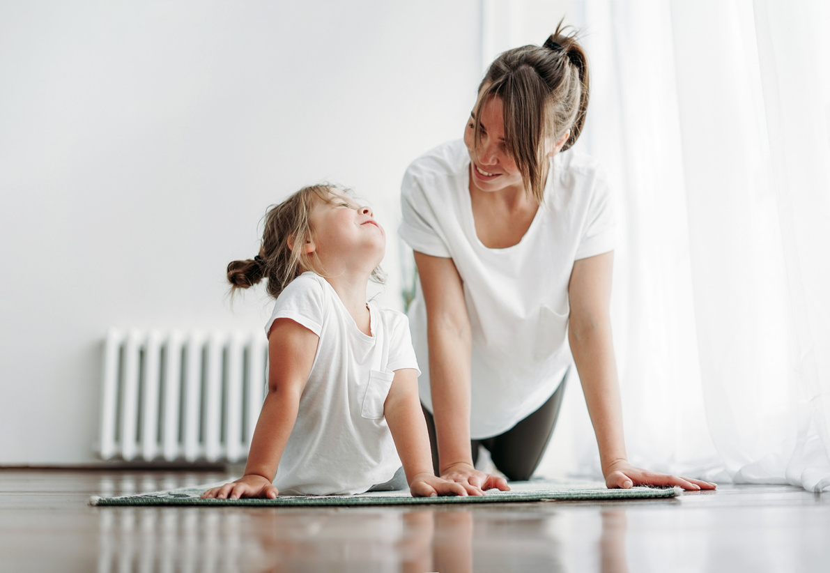 Mother and Daughter Doing Morning Exercise
